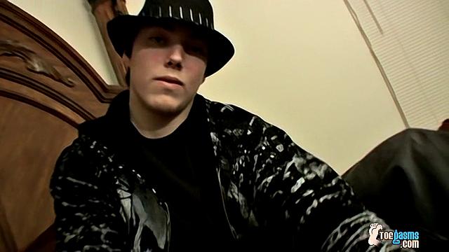 Blinx strokes his cock and shoots a load all over his sweaty feet