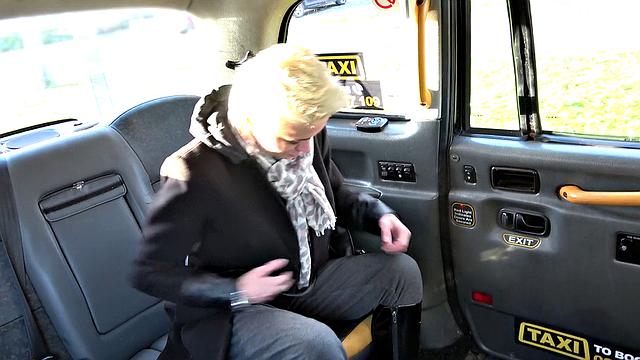 Blonde with huge knockers gives a sloppy handjob and deepthroats a cab