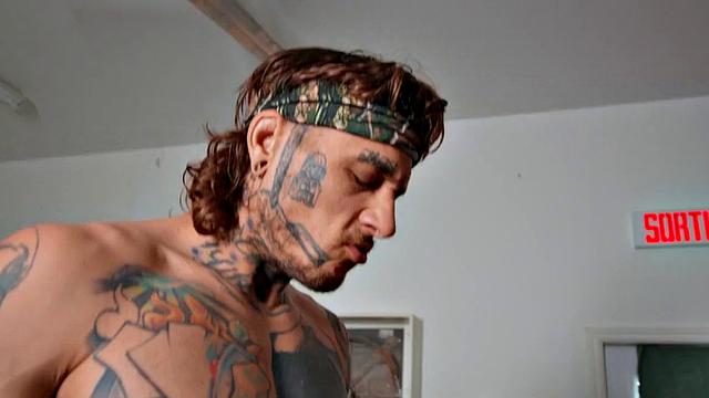 Sportive tattooed jock fucks bottom in boxing ring