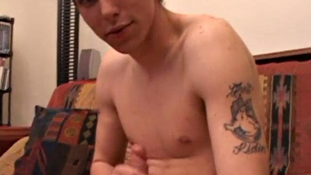 After rubbing up a stiff one, Sean unzips and starts stroking his hard cock and pleasures himself with his tongue. He eats his pre-cum, plays with his balls, and pumps out a huge cum gushing load.