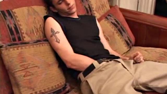 After rubbing up a stiff one, Sean unzips and starts stroking his hard cock and pleasures himself with his tongue. He eats his pre-cum, plays with his balls, and pumps out a huge cum gushing load.