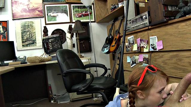 Petite redhead gives blowjob to huge cock and gets cumshot