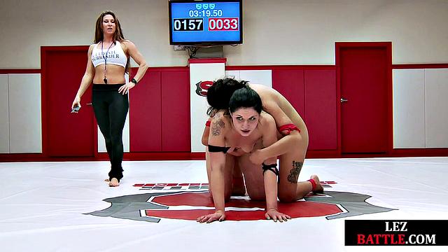 Naughty lez wrestlers fingering during fight