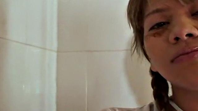 Watch this naughty 18-year-old get off with her small tits & pigtails in the bathroom