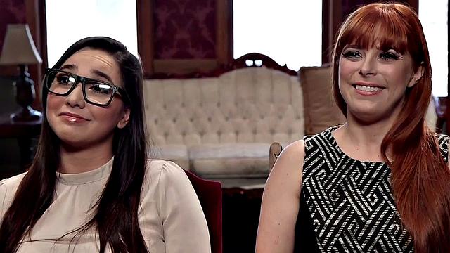 Ginger babe whipped in lingerie while bound in a hot threesome