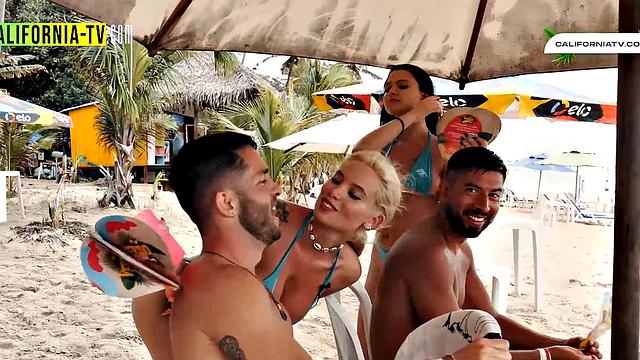 Hot influencer kisses tourist on beach in Brazil!