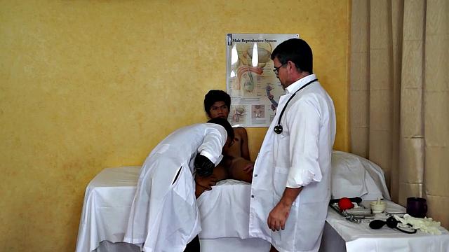 Petite Asian twink sucks doctors in 3some