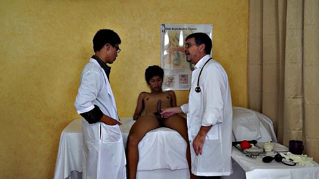 Petite Asian twink sucks doctors in 3some