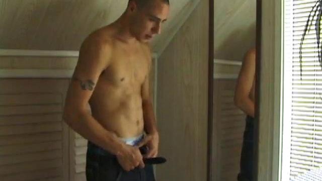 This tattooed hottie wants us to watch him jerk off. Bradley comes in and immediately takes charge of the task at hand. He starts a porn video, lubes up his dick and strokes out a healthy cum load all over mirror.