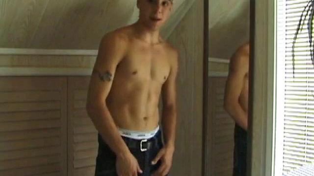 This tattooed hottie wants us to watch him jerk off. Bradley comes in and immediately takes charge of the task at hand. He starts a porn video, lubes up his dick and strokes out a healthy cum load all over mirror.