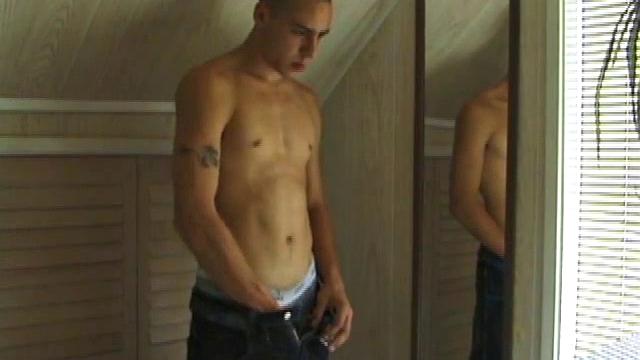 This tattooed hottie wants us to watch him jerk off. Bradley comes in and immediately takes charge of the task at hand. He starts a porn video, lubes up his dick and strokes out a healthy cum load all over mirror.