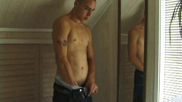 This tattooed hottie wants us to watch him jerk off. Bradley comes in and immediately takes charge of the task at hand. He starts a porn video, lubes up his dick and strokes out a healthy cum load all over mirror.