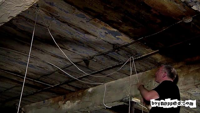 Max Brown and Sebastian Kane take control with pallet wrap for intense gay restraint and steamy domination play