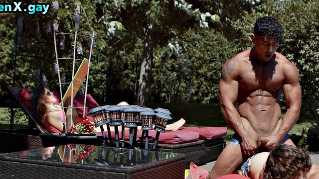 Manly stud with muscled body fucks twink outdoors by the pool