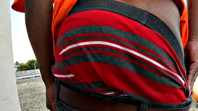 Real picked up Ebony drilled outdoors in public place