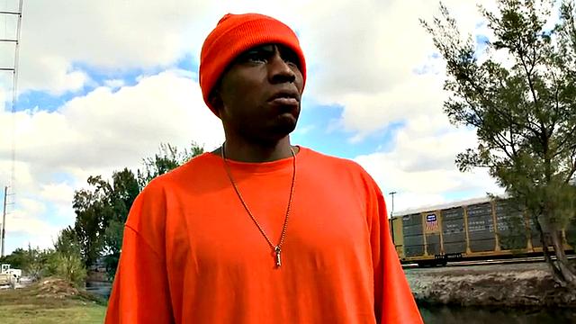 Real picked up Ebony drilled outdoors in public place