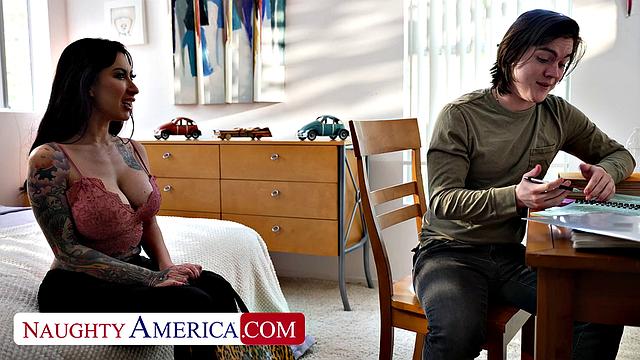 Busty tattooed hottie Lily Lane seduces boyfriend's son in lingerie