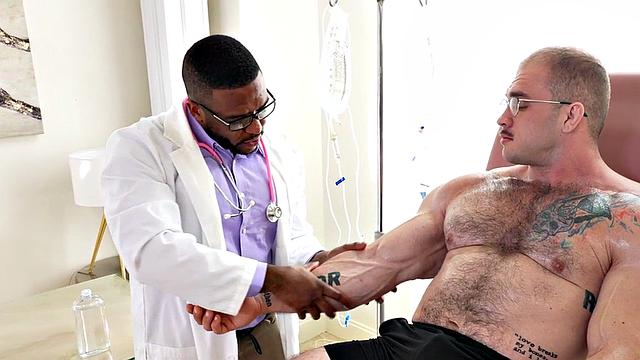 Muscled hunk jerked off by Black doctor with muscle fetish