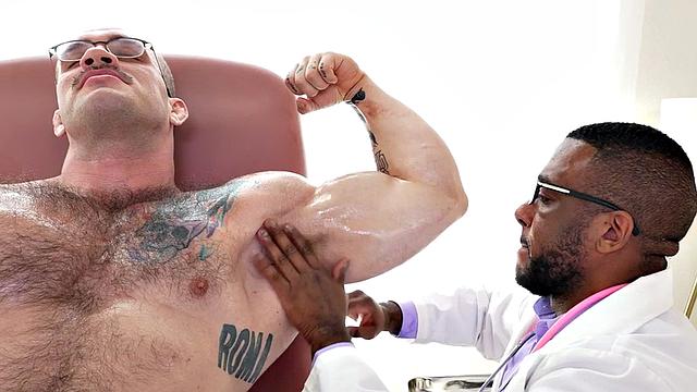 Muscled hunk jerked off by Black doctor with muscle fetish