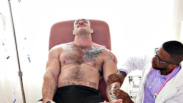 Muscled hunk jerked off by Black doctor with muscle fetish