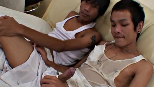 Skinny Asian twinks enjoy pissing anal fun at home