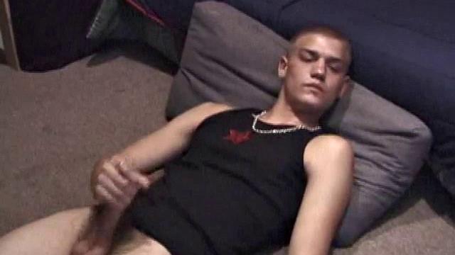 Lance is kicked back, while watching a porn video, as he works up a stiff one. Some determined cock stroking causes a cum explosion onto Lance's shirt, which he quickly licks up.