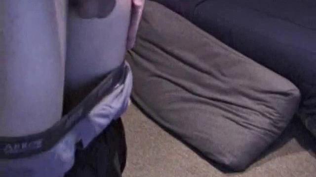 Lance is kicked back, while watching a porn video, as he works up a stiff one. Some determined cock stroking causes a cum explosion onto Lance's shirt, which he quickly licks up.