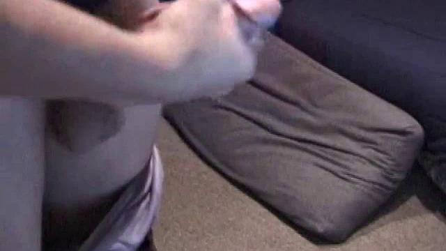 Lance is kicked back, while watching a porn video, as he works up a stiff one. Some determined cock stroking causes a cum explosion onto Lance's shirt, which he quickly licks up.