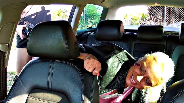 Blonde Explores Cabbie's Cock and Ball in a Taxi Ride