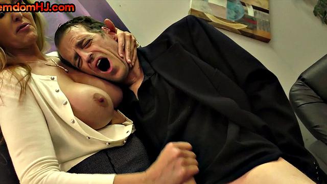 Mean domina wanks hard cock in office till cumshot