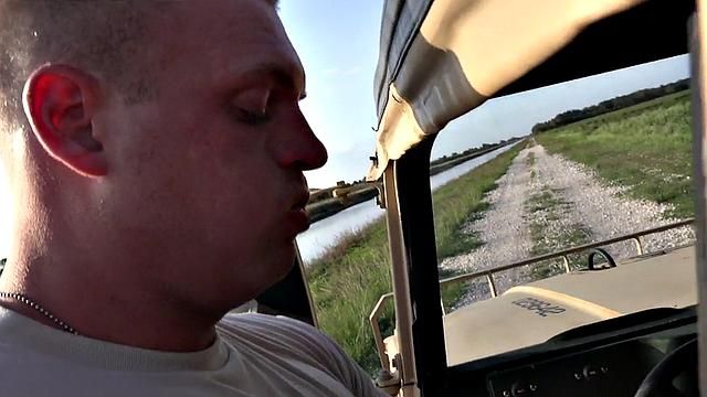 Outdoor soldier fucks military bottom on truck