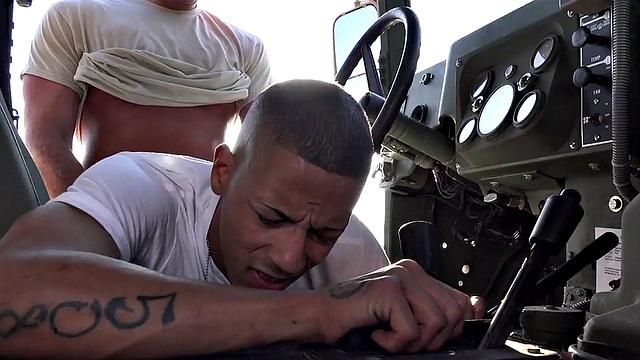 Outdoor soldier fucks military bottom on truck