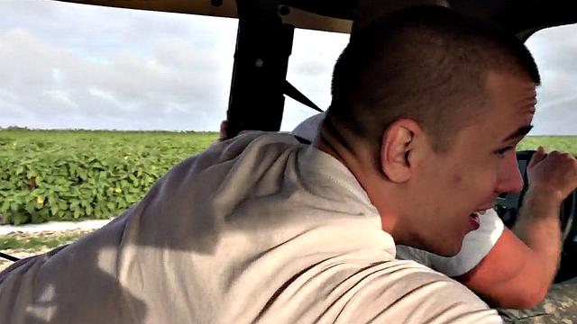 Outdoor soldier fucks military bottom on truck