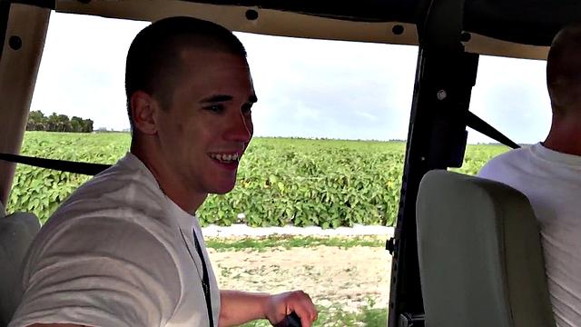 Outdoor soldier fucks military bottom on truck