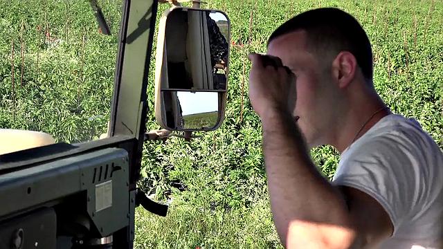 Outdoor soldier fucks military bottom on truck