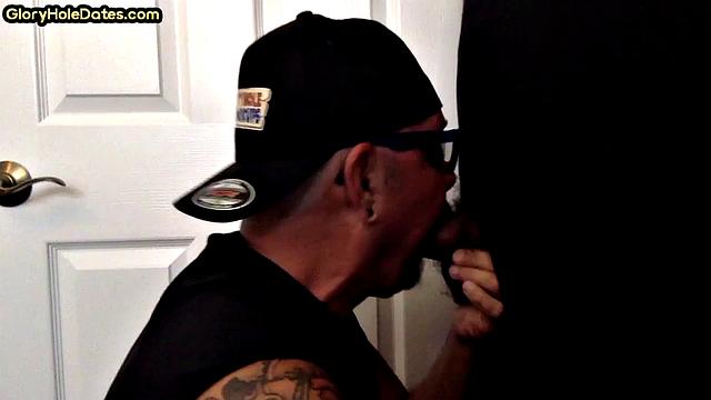 Real tattooed gay daddy sucks gloryhole at home