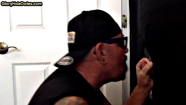 Real tattooed gay daddy sucks gloryhole at home