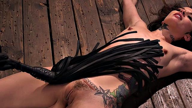 Submissive tattooed babe whipped after dildo blowjob