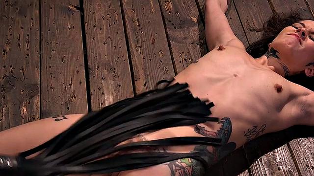 Submissive tattooed babe whipped after dildo blowjob