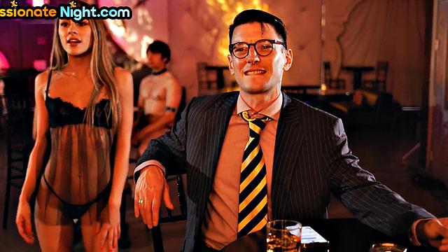 Busty MILF domme spanking pathetic loser in front of crowd