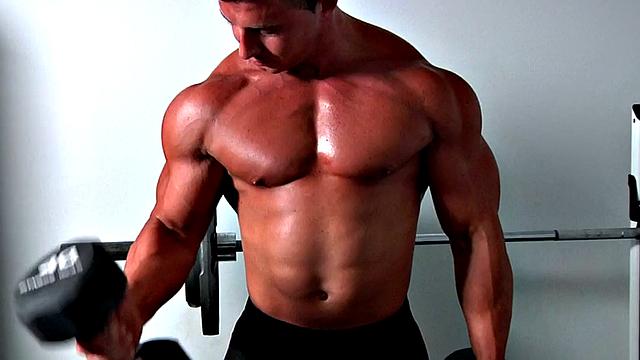 Muscled gym jock fucked in ass by stud in room