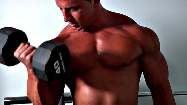 Muscled gym jock fucked in ass by stud in room