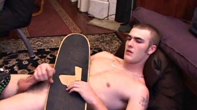 After some skateboarding, Christian Wilde works up a stiff one thru his pants and pulls it out. Some double-handed stroking eventually sends a cum gusher onto his chest.
