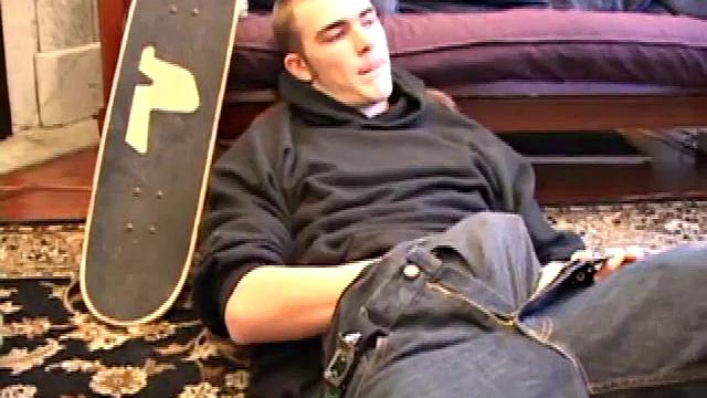 After some skateboarding, Christian Wilde works up a stiff one thru his pants and pulls it out. Some double-handed stroking eventually sends a cum gusher onto his chest.
