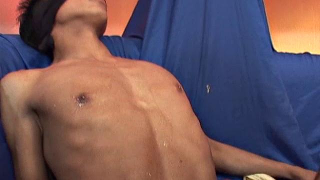 Juan Carlos enjoys a kinky encounter with skinny little Riky that involves a blindfold and some fruit, as the boys suck. Then Juan pushes his big fat uncut dick up the little guy's ass and fucks the cum out of him.