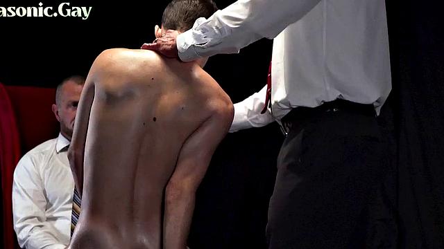 Mature gay mason in suit whips skinny twink