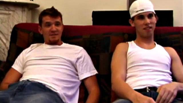 Lic seems very much at ease with Tapher. Both guys are in jeans and t-shirts, but lose them as they settle into each other. First, Lic slides his hand down his pants to work up a stiff one, while Tapher rubs one up from the outside.