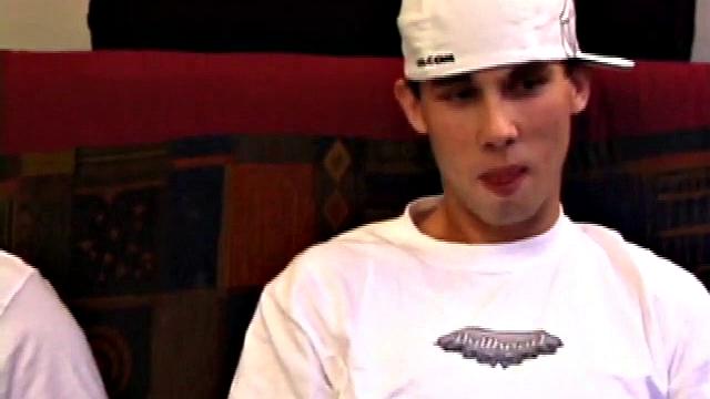 Lic seems very much at ease with Tapher. Both guys are in jeans and t-shirts, but lose them as they settle into each other. First, Lic slides his hand down his pants to work up a stiff one, while Tapher rubs one up from the outside.