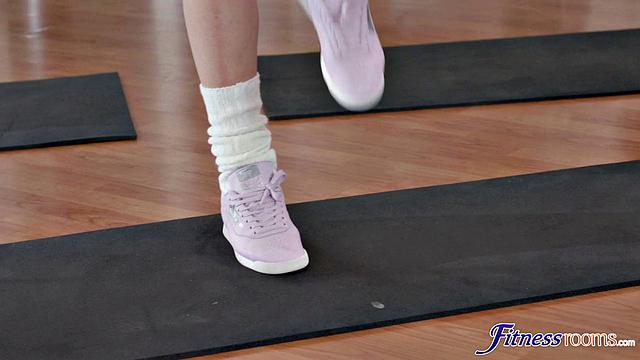Lesbian threesome at the gym