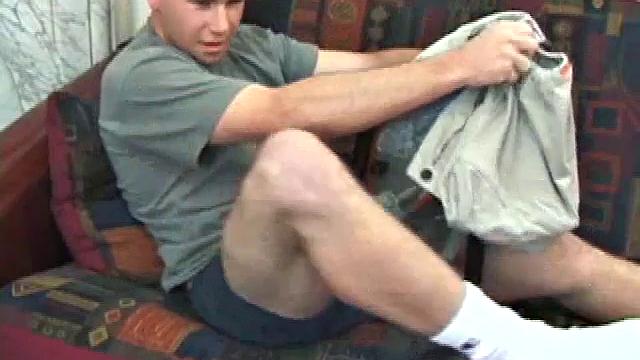 New comer pops in a porn video and slides his hands down his pants. He rubs his dick through his blue boxers, until it's stiff and ready to action. Then starts stroking his boner with determination until it releases its load.